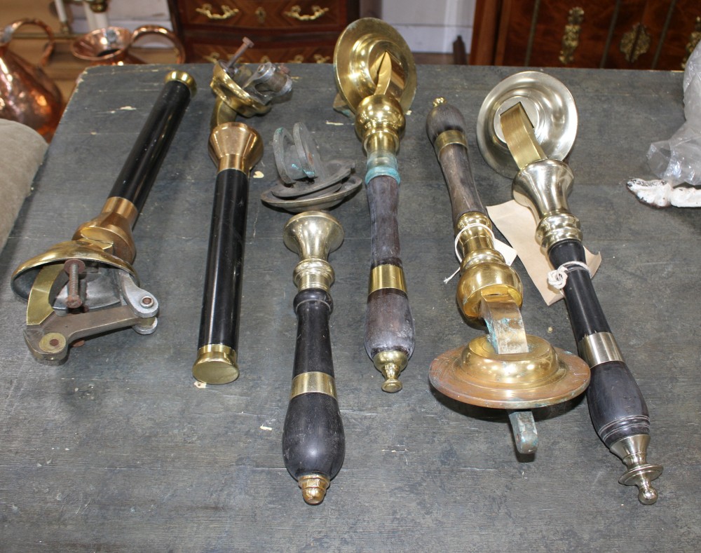 Two pairs of brass mounted beer pumps and two single pumps, largest 46cm